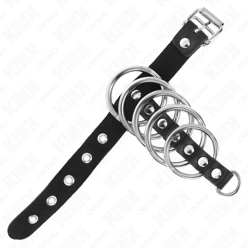 Kink Anneau Pénis en Cuir avec Sangle de Verrouillage 21 X 2 cm et 5 Anneaux Métalliques de 3 cm à 4 cm