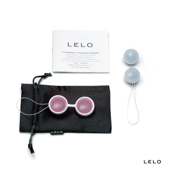 Quatre boules LUNA Beads Classic avec support blanc, pochette noire et documentation LELO