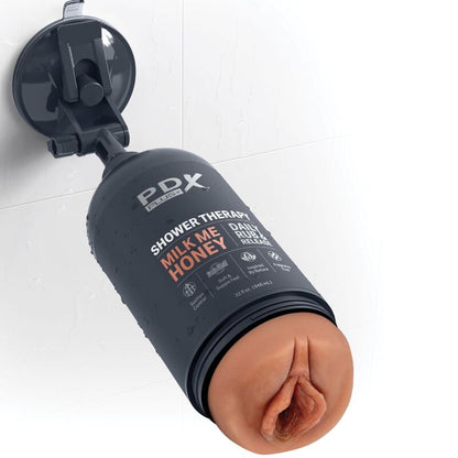 PDX PLUS - MASTURBADOR STROKER DISEÑO DE BOTELLA DISCRETO MILK ME CHAMPÚ DE CARAMELO DE MIEL
