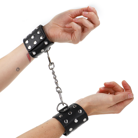 KINK - SUJECIONES DE MUÑECA CON CIERRE A PRESIÓN LLENO DE REMACHES NEGRO AJUSTABLE 19-24 CM X 5.5 CM