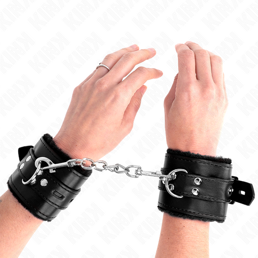 KINK - SUJECIONES DE MUÑECA CON FORRO DE PIEL, AGUJEROS CUADRADOS NEGROS Y CINTURÓN NEGRO AJUSTABLE 17-29 CM X 6 CM