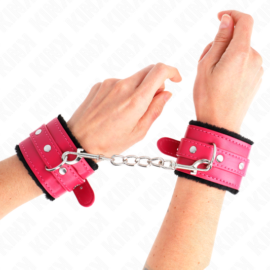 KINK - REPOSAMUÑECAS PREMIUM CON FORRO DE PIEL NEGRA Y CINTURÓN AJUSTABLE ROSA FRAMBUESA 17-29 CM X 6 CM