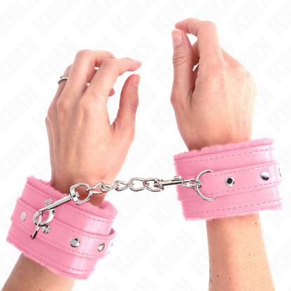 KINK - REPOSAMUÑECAS PREMIUM CON FORRO DE PIEL ROSA Y CINTURÓN AJUSTABLE ROSA 17-29 CM X 6 CM