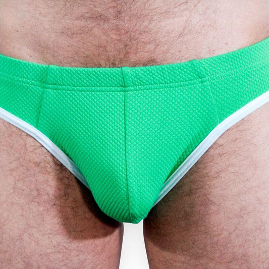 Slip homme BURN 022 vert à liserés blancs porté, vue avant